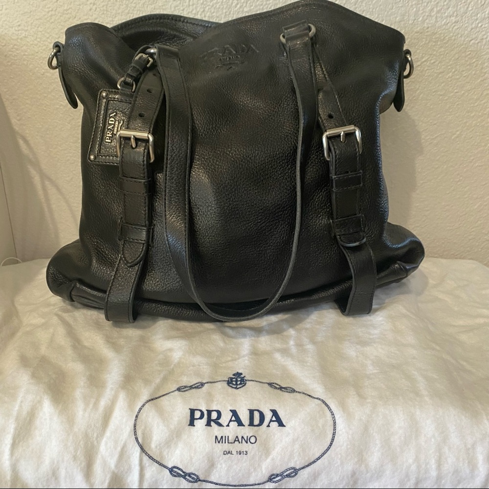Prada black pebbled deerskin convertible bag.